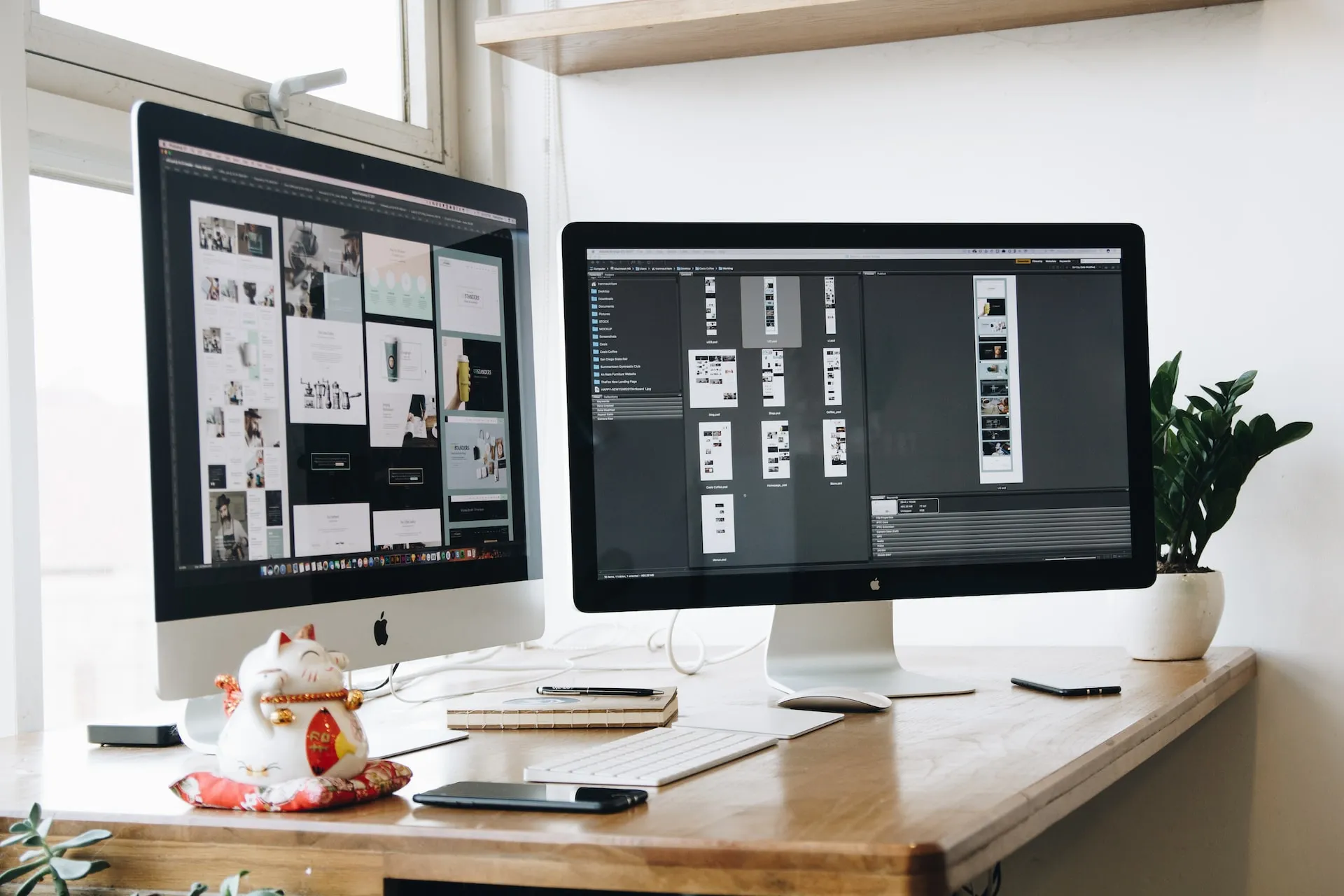 Web design mockups on a dual monitor setup